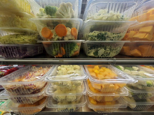 istock Cut vegetables in plastic containers on display in supermarket 2196231580