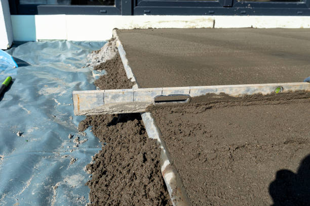 istock Pouring handmade concrete on to a home terrace covered with reinforcement. 2196231833