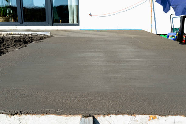 istock Pouring handmade concrete on to a home terrace covered with reinforcement. 2196233195