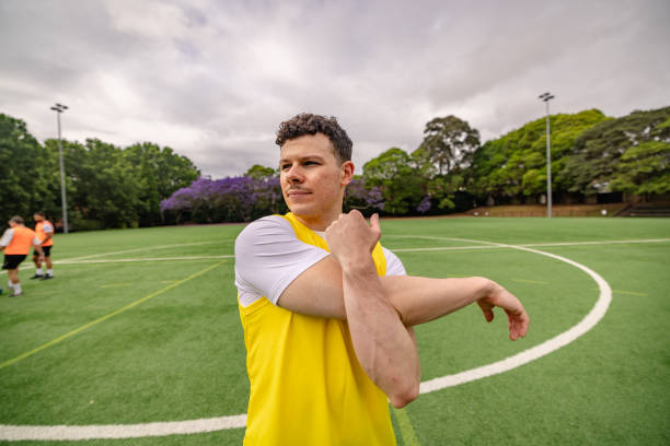 istock Soccer practice session in Sydney featuring young men engaging in teamwork and stretching exercises 2196233203