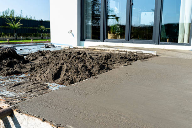 istock Pouring handmade concrete on to a home terrace covered with reinforcement. 2196233211