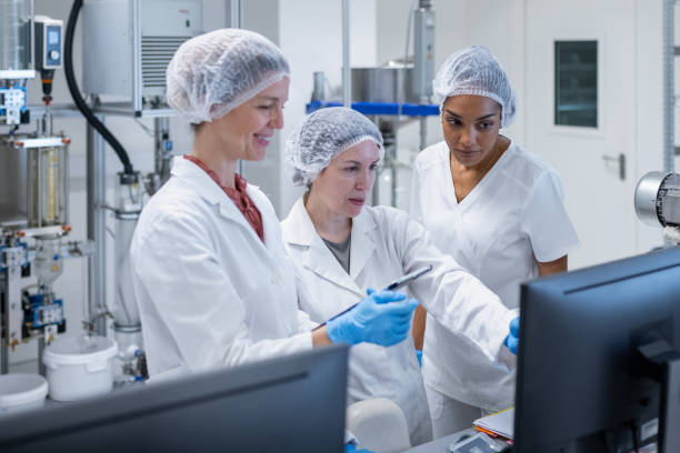 istock A group of female pharmacists behind  computers in a pharmaceutical laboratory in the production of cosmetic products 2196233647