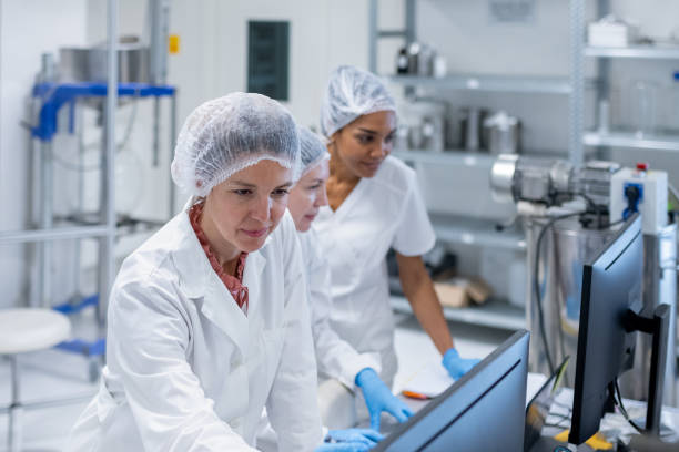 istock A group of female pharmacists behind  computers in a pharmaceutical laboratory in the production of cosmetic products 2196233659