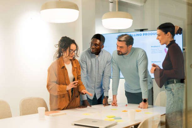 istock Marketing team analyzing data and developing new selling product during a meeting 2196235588