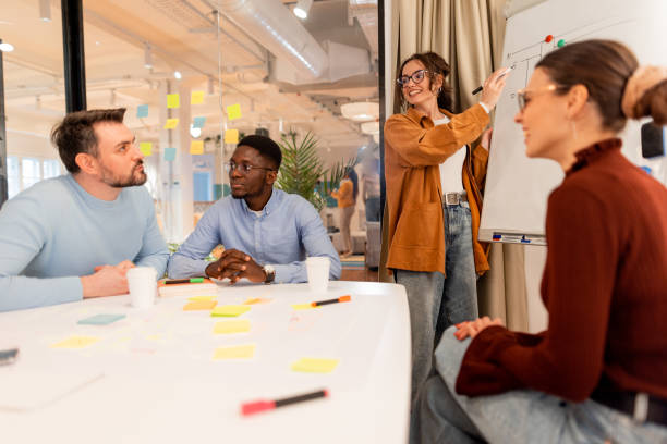 istock Young business team brainstorming during a meeting in the office 2196236035