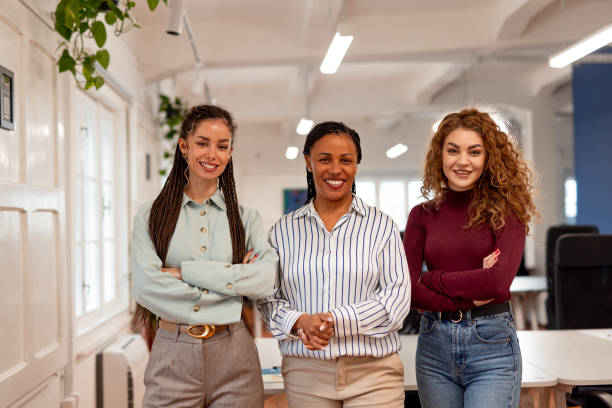 istock Confident Businesswomen Standing Together in a Modern Office Setting 2196236145