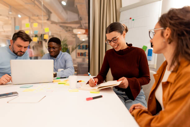 istock Business team collaborating on a project in a modern office 2196236533