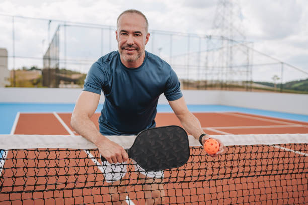 istock Portrait of a man playing pickleball 2196237995