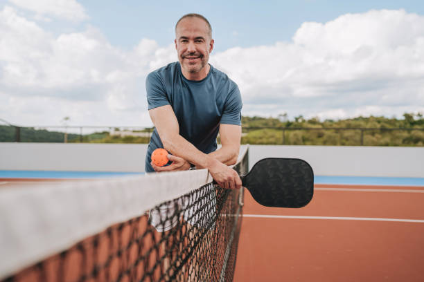 istock Portrait of a man playing pickleball 2196238034