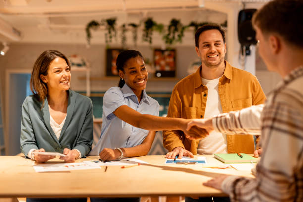 istock Business partners shaking hands after successful meeting in office 2196238426