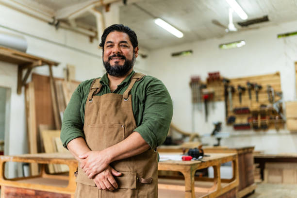 istock Portrait of mature carpenter man working at carpentry 2196238854