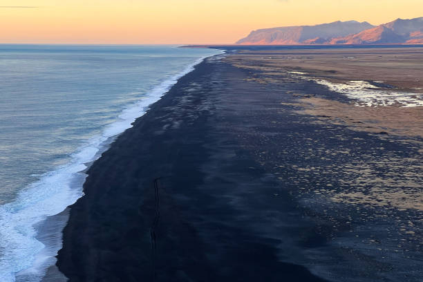 istock Scenic view from Reynisfjara black sand beach at sunset. 2196238984