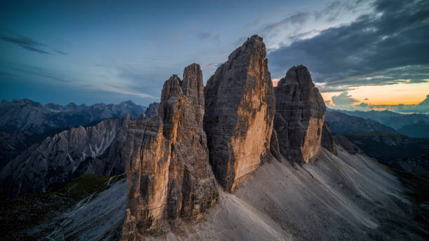 istock Tre Cime di Lavaredo mountains in the Dolomites at dusk 2196239384