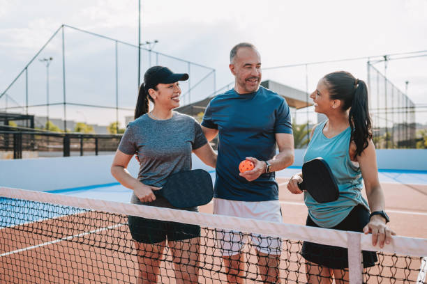 istock Group of friends playing pickleball 2196239678