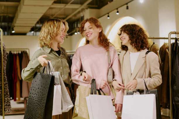 istock Girls Discussing Purchases 2196240529