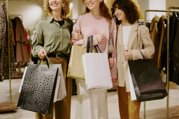 istock Unrecognizable Best Friends with Paper Bags 2196240562
