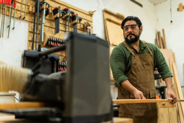 istock Mature carpenter man working at carpentry 2196240803