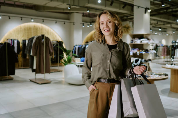 istock Blonde Woman with Purchase in Boutique 2196241504