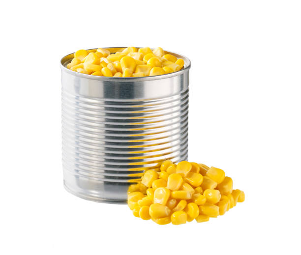 istock Open tin can of sweet corn kernels isolated on a white background. 2196242352