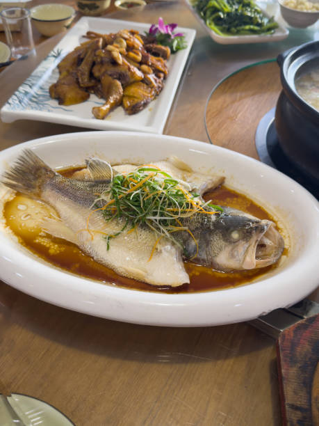 istock Steamed Fish with Scallions and Soy Sauce – A Chinese Culinary Classic 2196242447