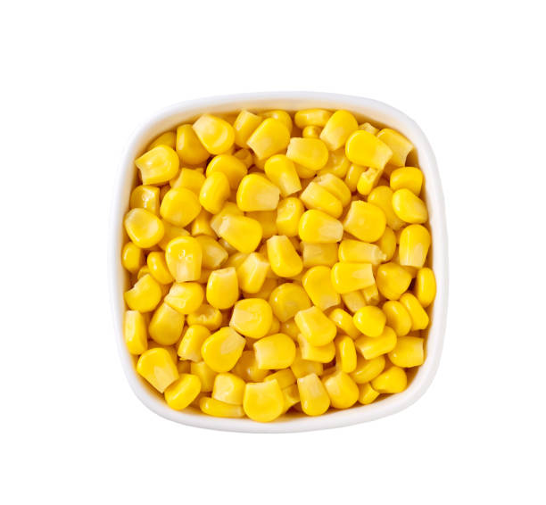 istock White ceramic bowl of sweet corn kernels isolated on white background, top view. 2196242459