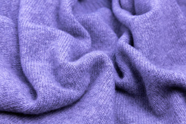 istock Textile purple background soft cashmere texture. Wool products. 2196242467