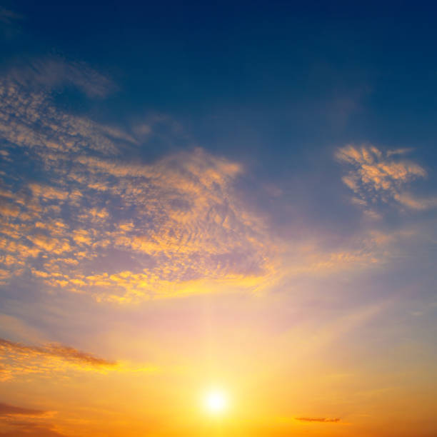 istock Beautiful sunset with bright sun and blue sky. 2196242659
