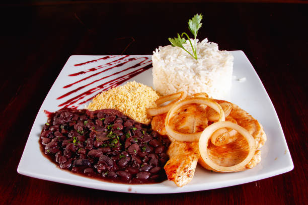 istock Chicken with onion, black beans, rice and flour 2196245088