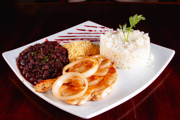 istock Chicken with onion, black beans, rice and flour 2196245097