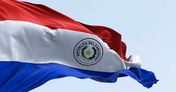 istock Paraguay national flags waving on a clear day 2196246191