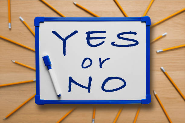 yes or no writing on white board. Business and planning, brainstorming, business decision making.