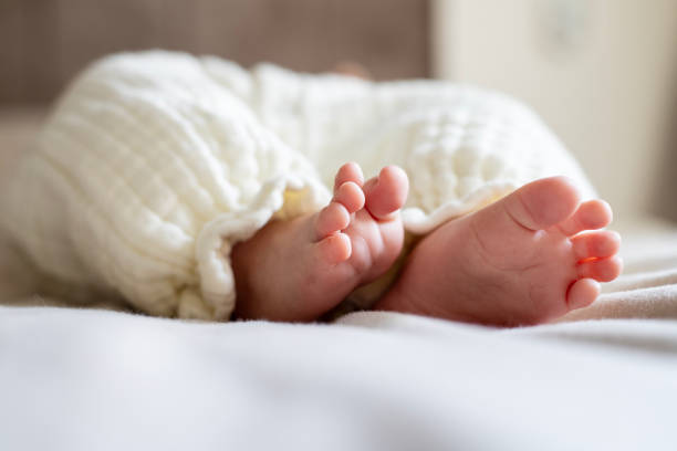 istock Foot of newborn baby 2196252885