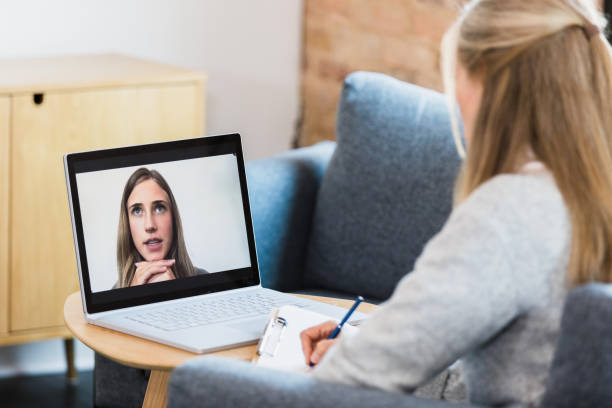 istock Online Therapy Session: Woman on Laptop Video Call 2196253361