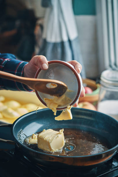 istock Preparing Tarte Tatin with Caramelized Apples in Domestic Kitchen 2196257043