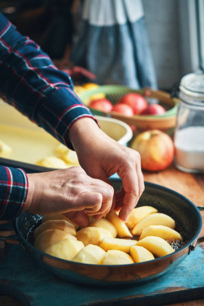 istock Preparing Tarte Tatin with Caramelized Apples in Domestic Kitchen 2196257329