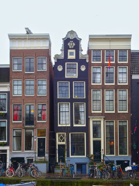 Typical Amsterdam houses over the blue sky winter season