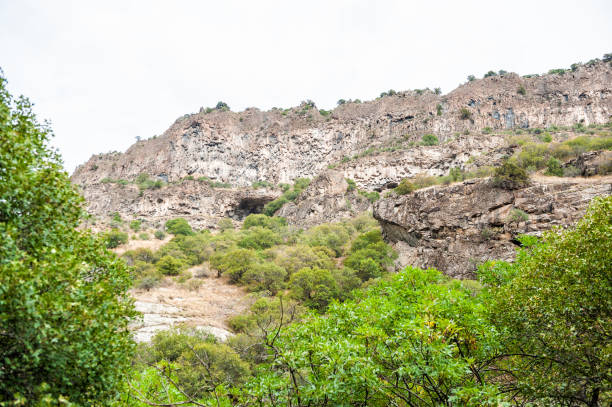 istock Rugged cliffs with lush vegetation creating a stunning natural canyon landscape 2196258261