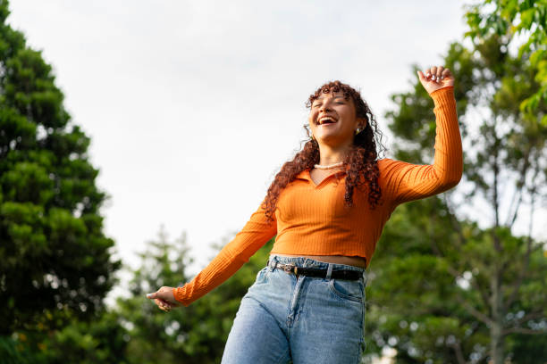 istock young woman enjoying the sun 2196258898