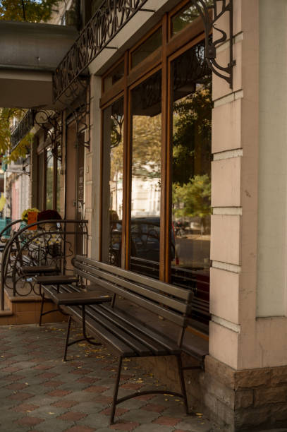 istock tables and benches near a street cafe 2196264294
