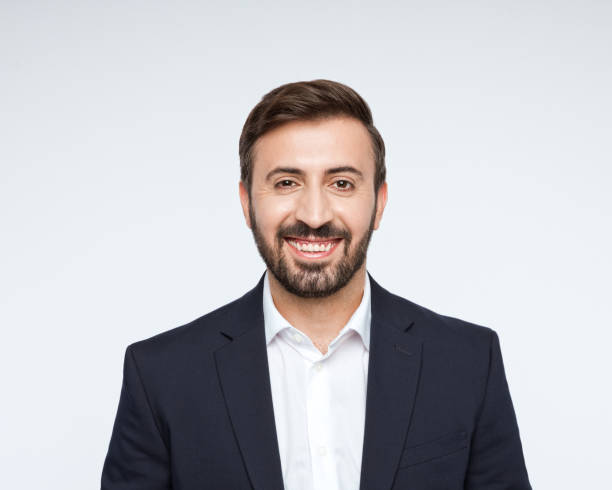 istock Headshot of friendly businessman 2196264474