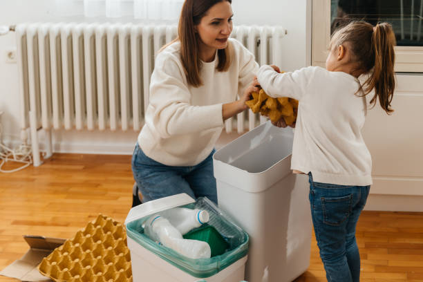 istock A family recycling moment , teaching sustainability 2196268598