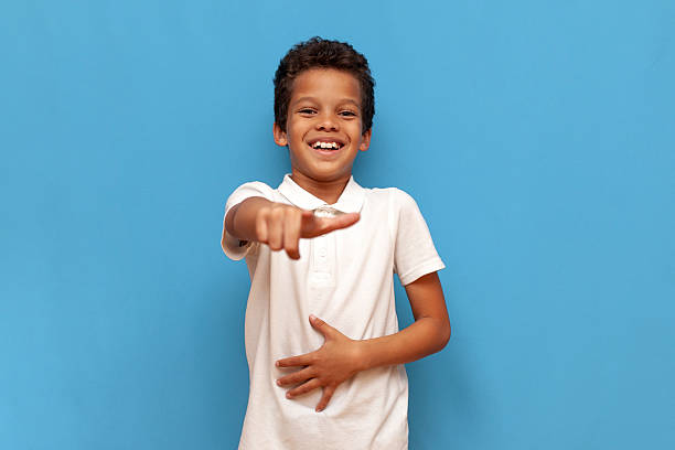 istock Emotive series with young boy against blue background 2196270467