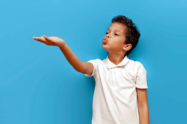 istock Emotive series with young boy against yellow background 2196270510