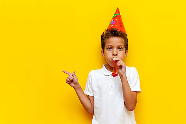 istock Emotive series with young boy against yellow background 2196270559