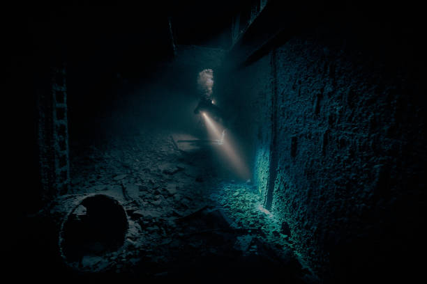 istock Mysterious underwater view inside the ship wreck of SS Thistlegorm - British cargo steamship sunk by German bomber in the Red Sea, near Sharm El Sheikh, Egypt. Underwater photography and travel 2196270797