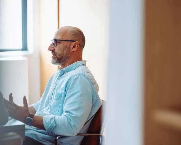 istock Professional Conversation with Mature Man in Office Environment During Daytime 2196271073