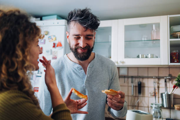 istock Couple Enjoying Breakfast Together in a Cozy Home Kitchen 2196271259