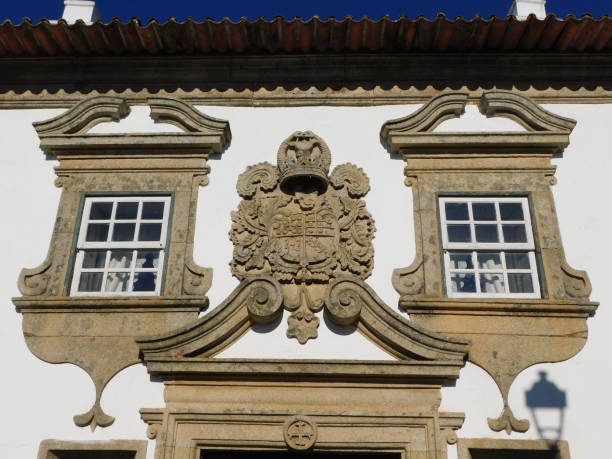 istock Old house with coat of arms on the facade 2196271479