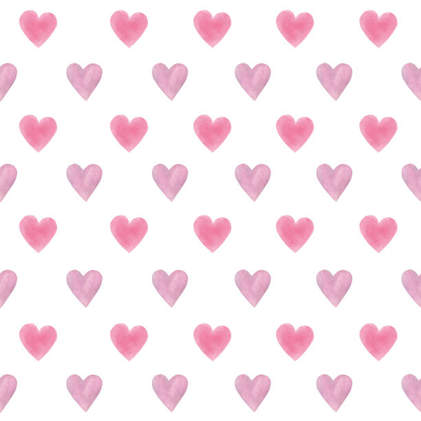 istock Watercolor hand drawn pink and purple small hearts seamless pattern on white background 2196271700