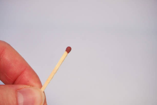 Matchstick in the middle of burning down